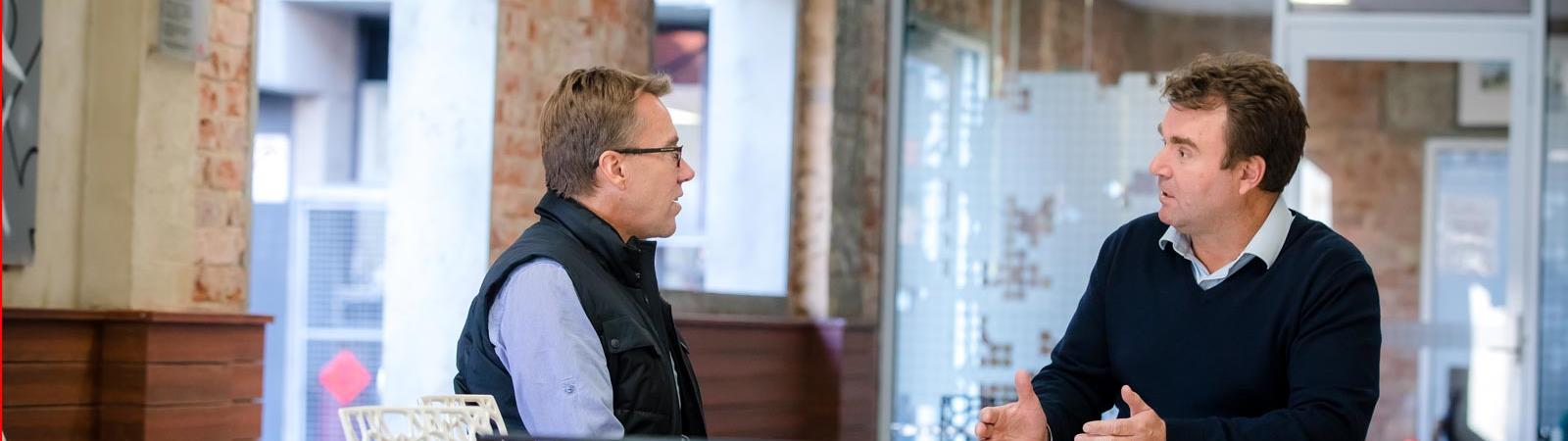Two colleagues are talking