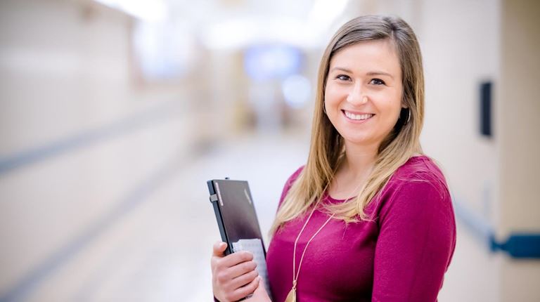 Employee with notepad