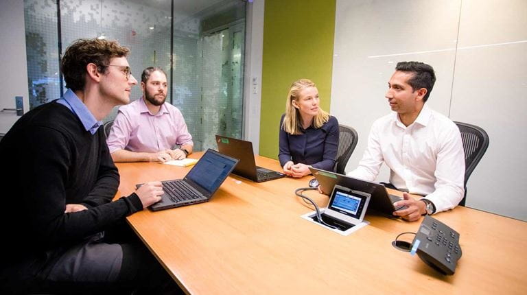 CSL employees in the meeting room